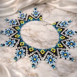 Elegant Beaded Necklace in Blue, Yellow, and Black